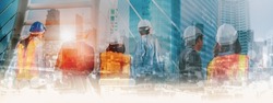 Double exposure manager engineer professional team,stand back view on construction building,city landscape background,site construction engineering project,duty in work site,panaromic header banner 