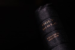 Holy Bible title on spine with black background