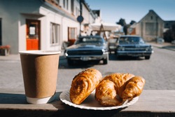 Breakfast croissants and coffee at the morning in small American town