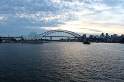 Beautiful view of the Sydney opera house and the harbour bridge at sunset