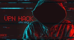 Virtual private network VPN hack concept with faceless hooded male person, low key red and blue lit image and digital glitch effect