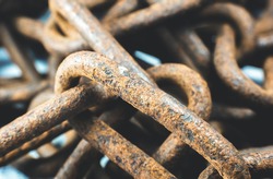 Rusty chains on white background. Close up photo.