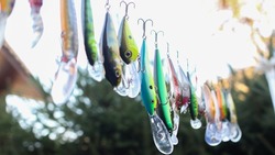 Fishing Lures. Set of wobblers of different colors and different purposes. Fishing gear. Fishing gear.