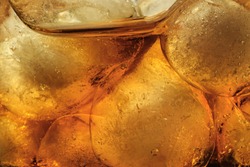 Macro photography of a drink with ice cubes