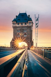Worms in Germany. The famous Nibelungen Bridge in the sunset. Motorway that goes through a historic city gate. unique shot - landscape