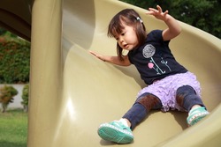 Japanese girl on the slide (2 years old)