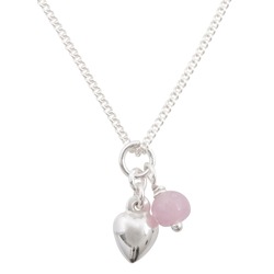 Silver or white gold chain necklace with heart pendant or heart charm with light pink stone or bead. Chain necklace on white background. Closeup view. 