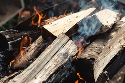 Logs make a fire. Bonfire smoke
