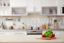 Products and blurred view of kitchen interior on background