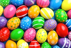 Many decorated Easter eggs as background, top view. Festive tradition