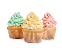 Delicious cupcakes with cream on white background
