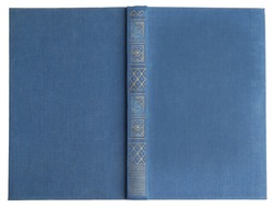 Open old book with vintage blue cover isolated on white, top view