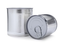 Closed tin cans of food on white background