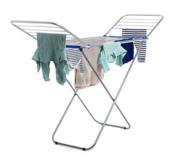 Modern drying rack with clothes on white background