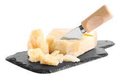 Parmesan cheese with knife and slate plate on white background