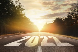 Start new year with fresh vision and ideas. 2022 numbers on asphalt road