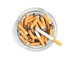 Glass ashtray full of cigarette stubs isolated on white, top view