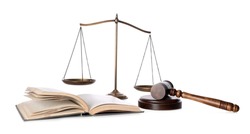 Wooden gavel, book and scales of justice on white background