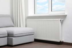 Modern radiator at home. Central heating system