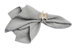 Fabric napkin with decorative ring for table setting on white background, top view