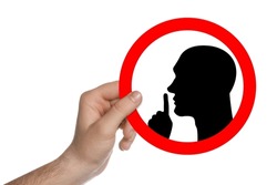 Quiet Please. Man holding sign with shush gesture image on white background, closeup