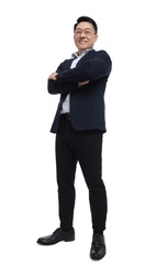 Businessman in suit posing on white background, low angle view
