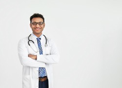 Handsome male doctor on white background