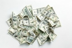 Heap of dollar banknotes on white background