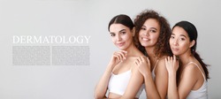 Beautiful young women and space for text on light background. Dermatology concept