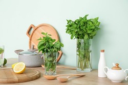 Fresh mint and citruses on kitchen table