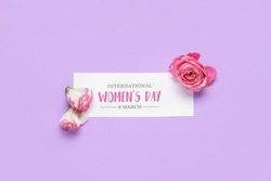 Greeting card for International Women's Day and flowers on lilac background