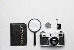 Set of travel items with passport on white background
