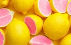 Many unusual pink lemon as background