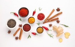 Composition with different spices isolated on white background