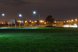 City park in the evening with a basketball court