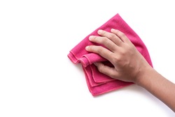 Closeup hand holding pink duster microfiber cloth for cleaning isolated on white background with clipping path.