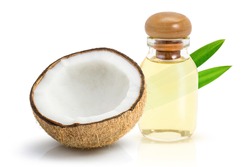 Coconut oil in glass bottle with coconut fruit isolated on white background.
