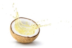 Coconut oil splash from coco nut fruit isolated on white background.