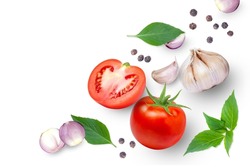 Tomato with basil leaves, garlic, onion and black pepper isolated on white background. Top view. Flat lay. Copy space.