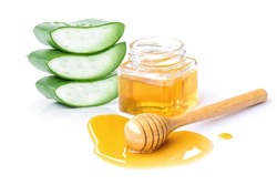 Honey and aloe vera cut sliced isolated on white background. Natural medicine plant, beauty and spa concept.