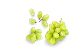 Green muscat grapes and half sliced isolated on white background. Top view. Flat lay. Grape pattern texture background. 