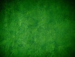 Beautiful decorative Venetian plaster in green. Plastered wall texture for backgrounds