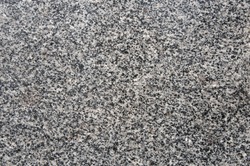 Natural stone. Grey, black and white granite texture, granite surface and background. Material for decoration texture, interior design