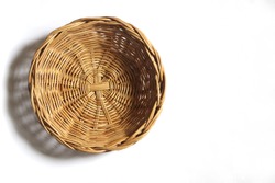 Empty Wicker basket on white background. Top view.