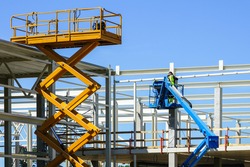 modern mobile self propelled hydraulic lifting platform and scissor lift in action
