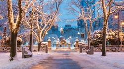 The architecture of Boston in Massachusetts, USA in the winter season showcasing the Boston Public Garden at Back Bay.