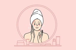 Smiling young woman in towel after shower look in mirror do morning facial care procedures. Happy girl apply face cream for healthy skin. Skincare treatment and beauty. Flat vector illustration. 