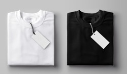 Black and white folded t-shirt with label.