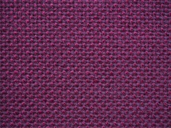Close-up of the purple textile texture, background and wallpaper. The texture of purple fabric textile upholstery of furniture. High-quality macro photography.