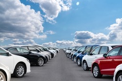 A lot of cars in a rows. Used car sales